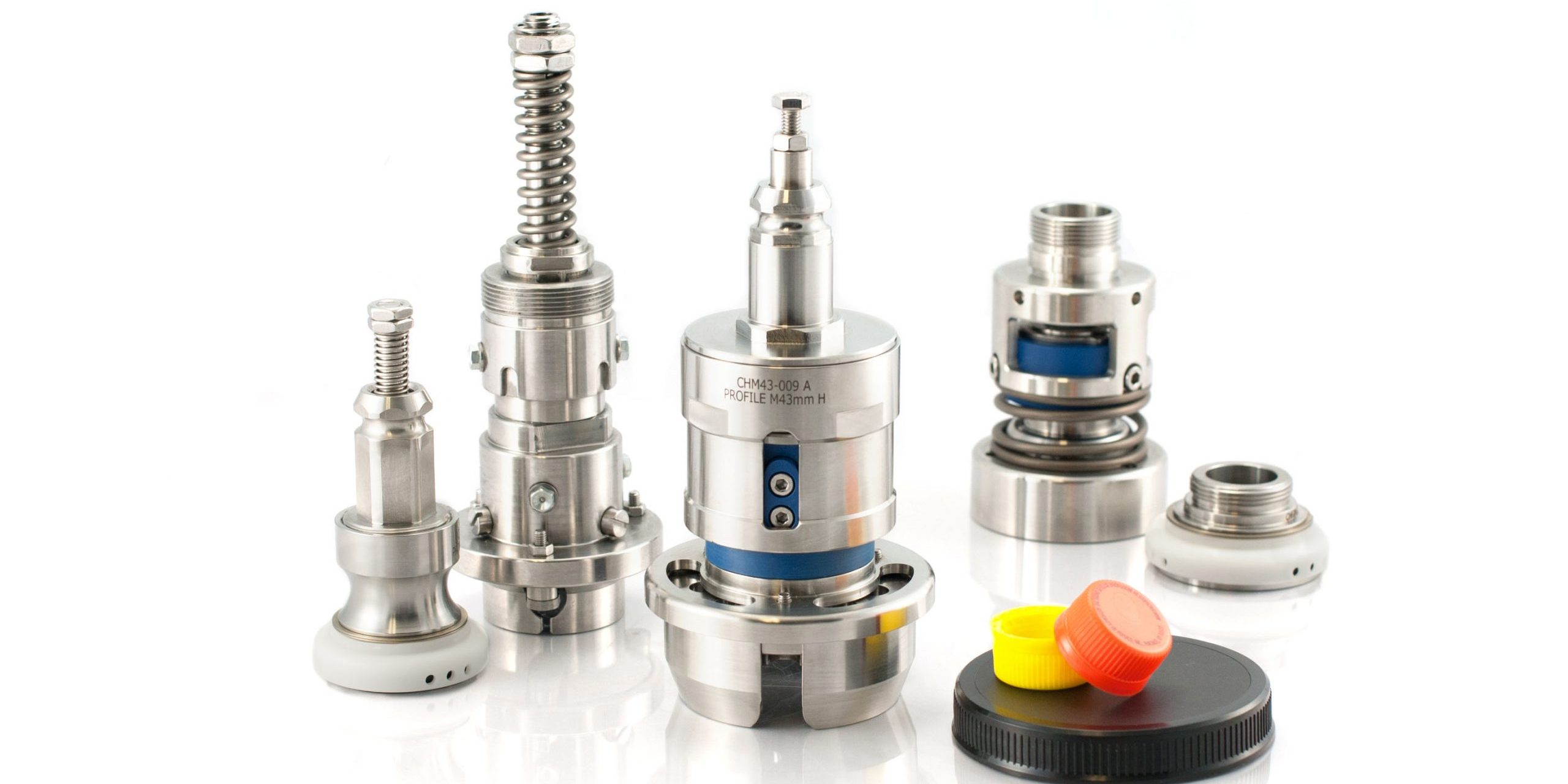 Precision Tork clutches and chucks A set of stainless steel chucks and clutches. A few colored bottle caps