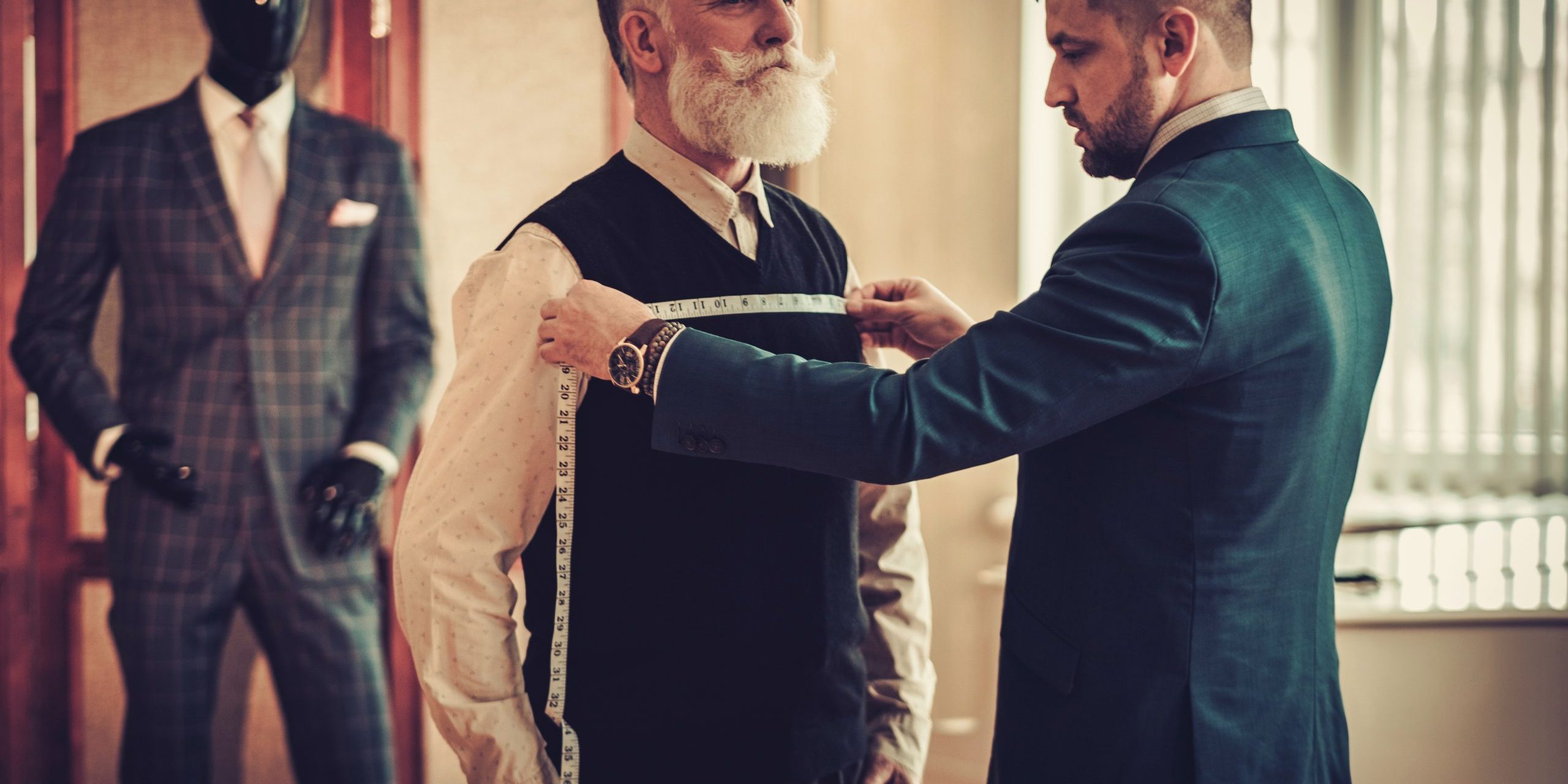 Tailor Measuring a Customer Tailor Measuring a Customer